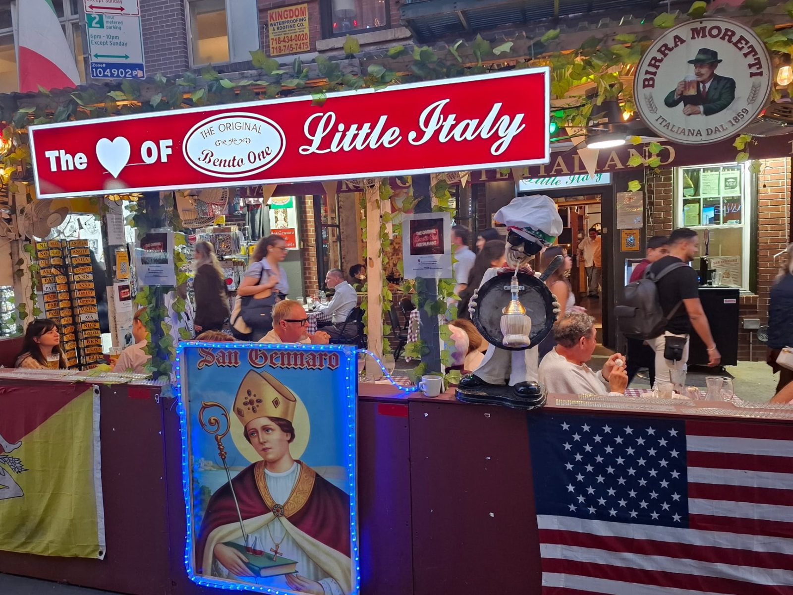 The colorful Benito One storefront and street display on Mulberry Street